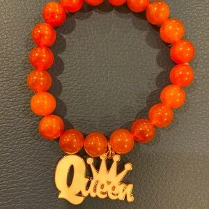 Orange Beaded Bracelet with 'Queen' Charm
